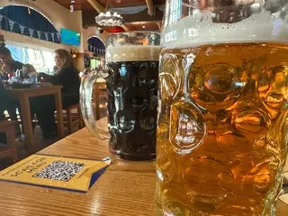 Photo of large mugs of beer