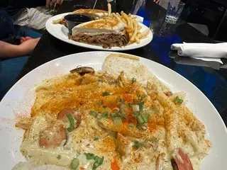Photo of pasta and a french dip